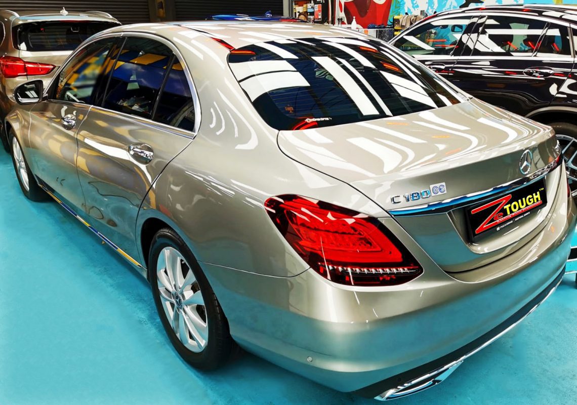 Rear quarter of the Mercedes-Benz C180, glossy and protected.