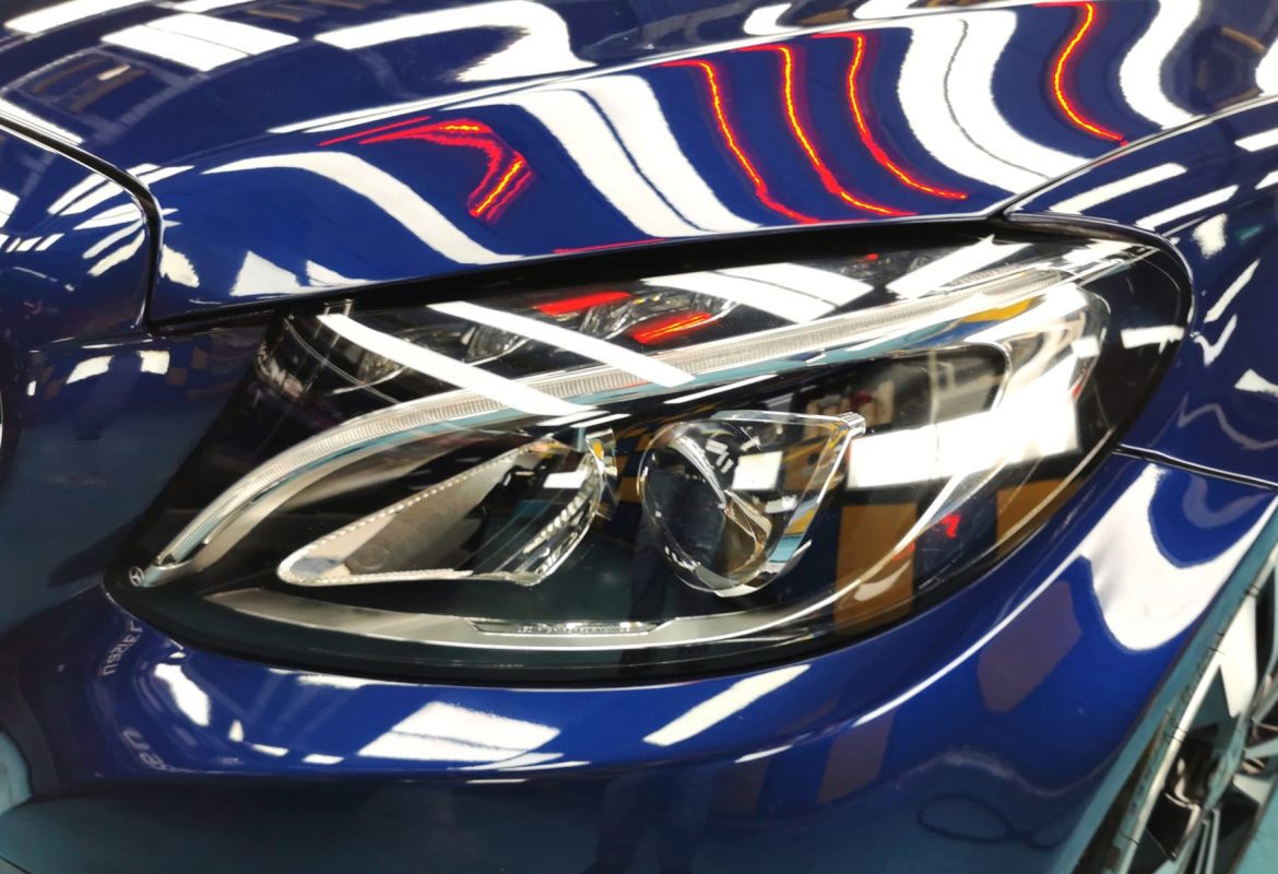 The C180's coated paintwork showing clean reflections.