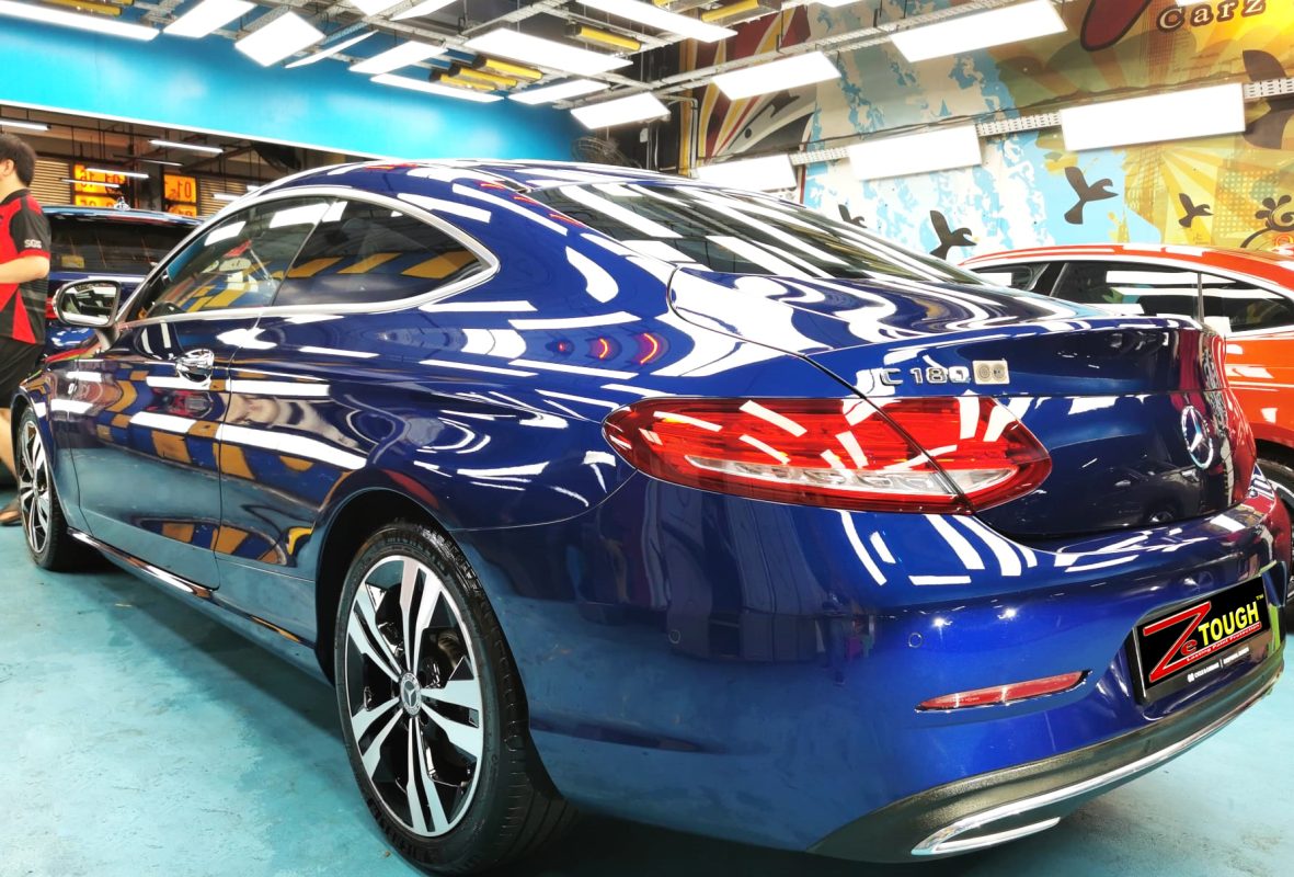 Rear quarter of the Mercedes-Benz C180, glossy and protected.
