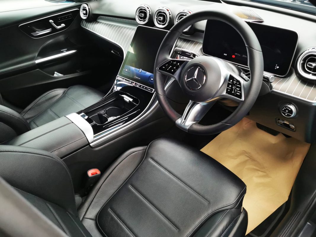 The Mercedes-Benz C200 parked in the workshop, freshly coated.