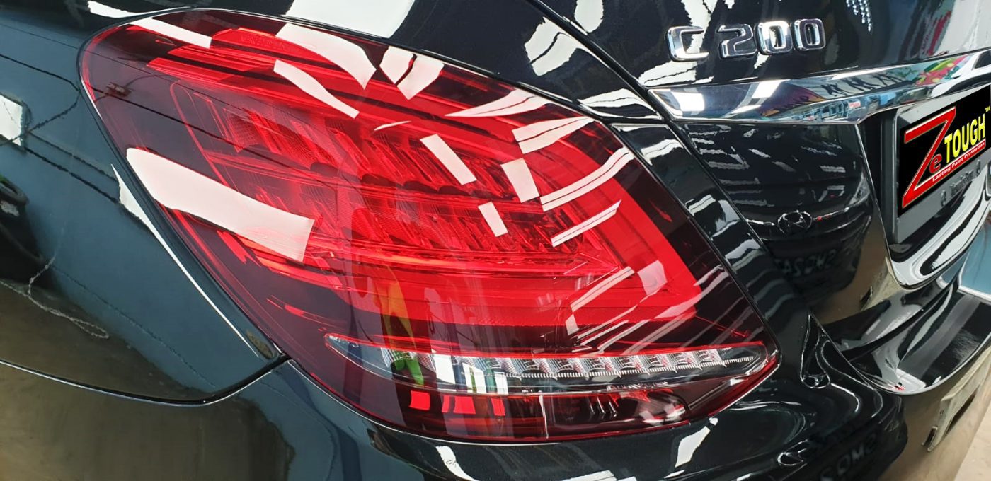 Rear quarter of the Mercedes-Benz C200 AMG, glossy and protected.