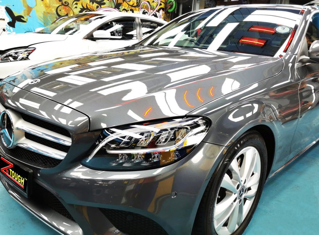 The Mercedes-Benz C200 from a side angle after the ceramic coating.