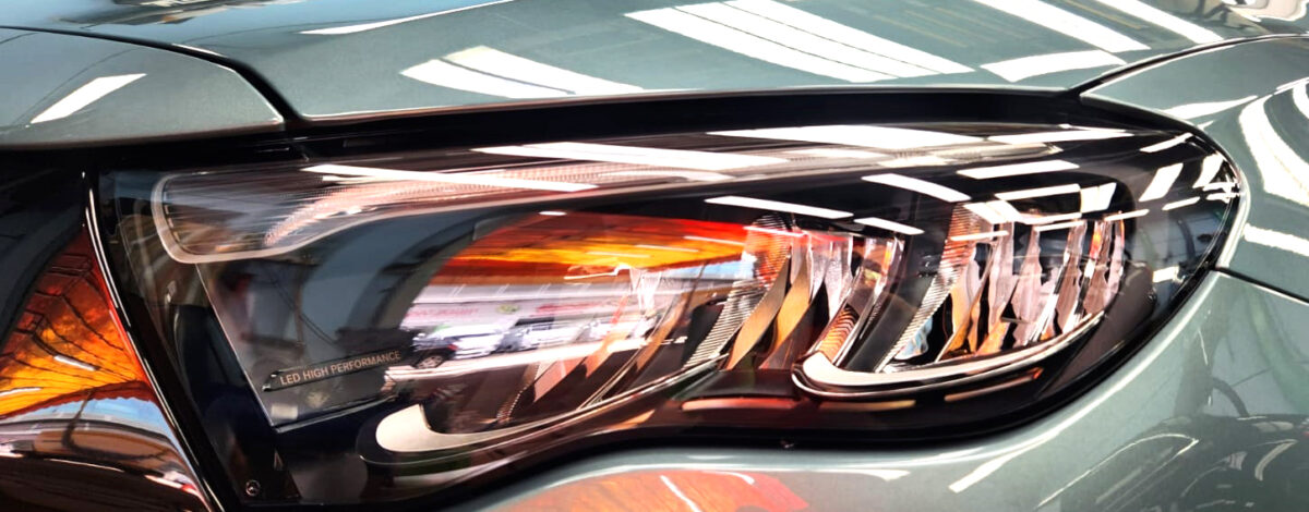 The C200's coated paintwork showing clean reflections.