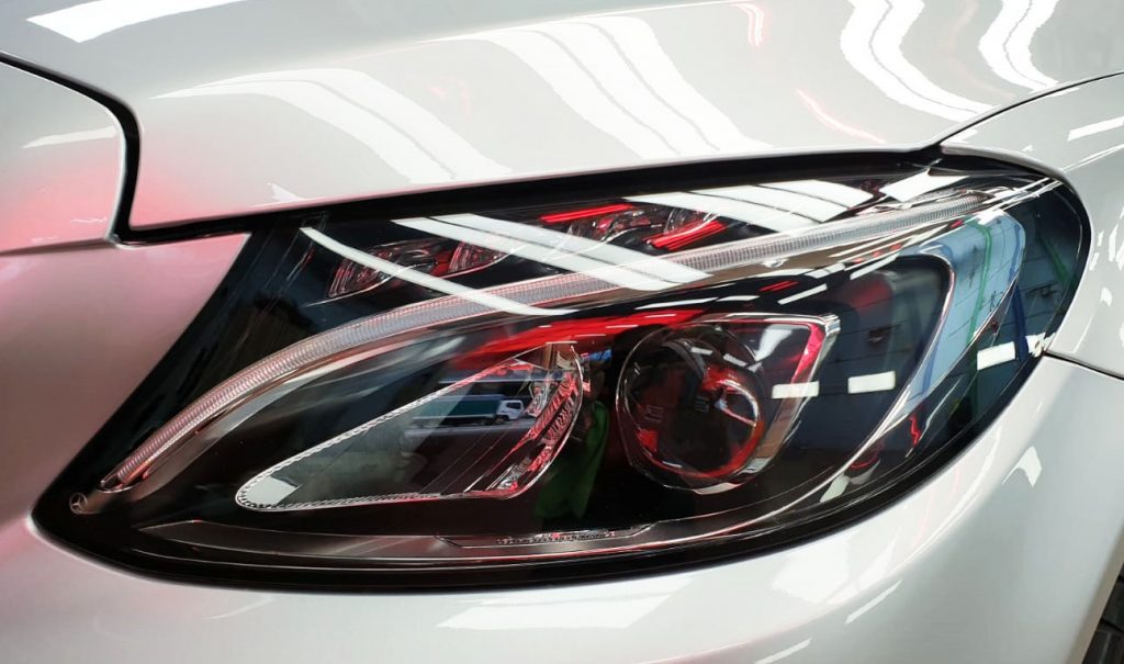 The C200's coated paintwork showing clean reflections.