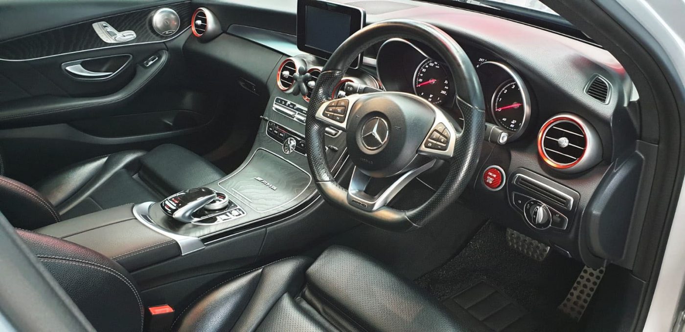 The Mercedes-Benz C200 parked in the workshop, freshly coated.