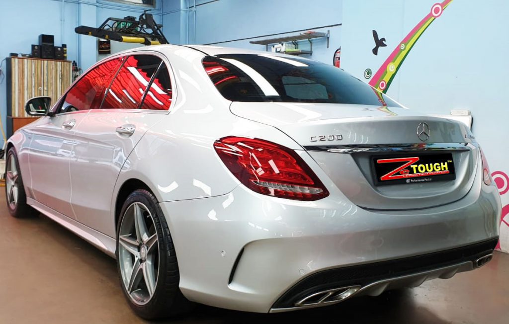 Rear quarter of the Mercedes-Benz C200, glossy and protected.