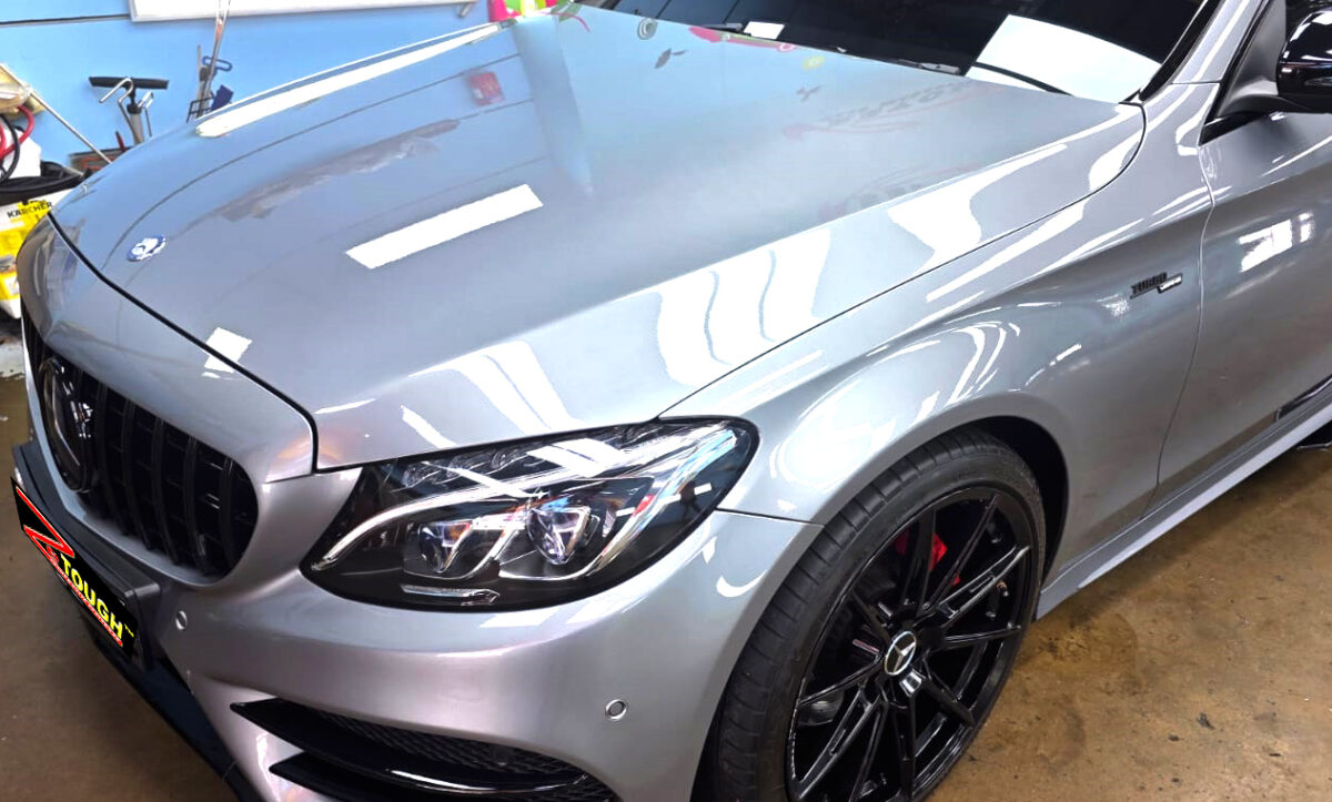 The Mercedes-Benz C200 from a side angle after the ceramic coating.