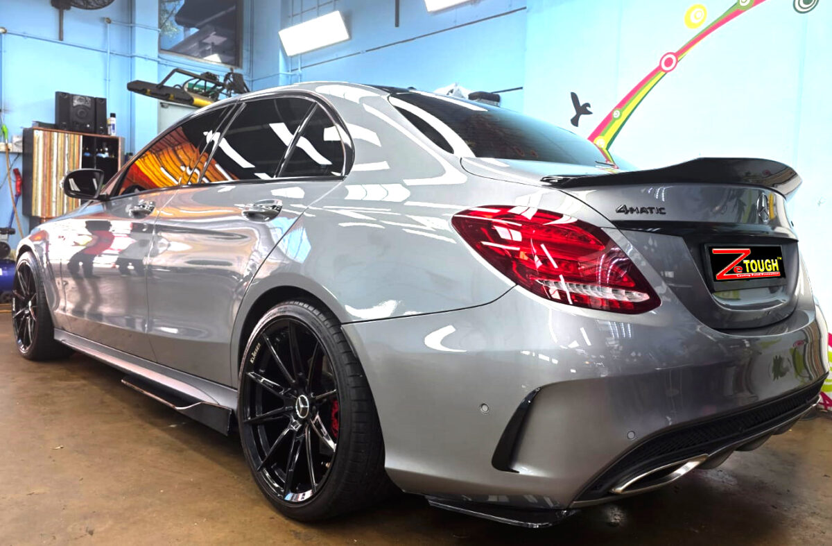 Rear quarter of the Mercedes-Benz C200, glossy and protected.