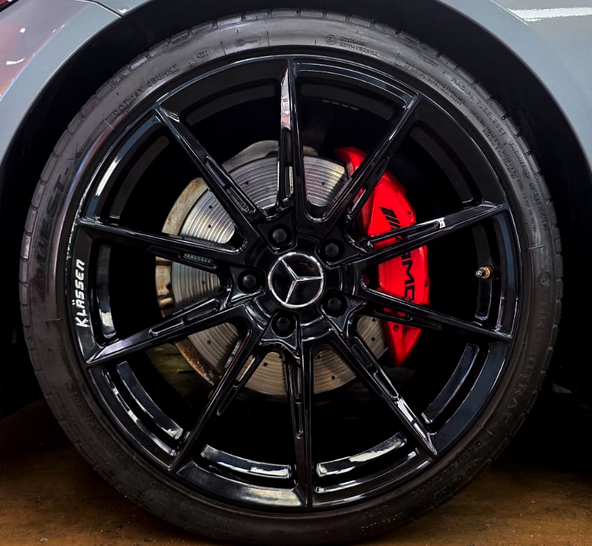 Wheel and panel edge detail on the coated Mercedes-Benz C200.