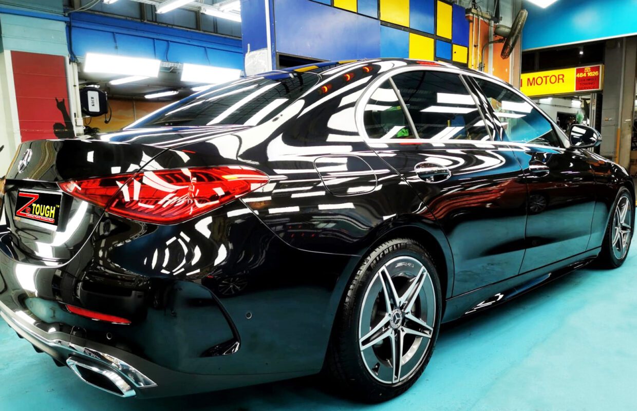 Rear quarter of the Mercedes-Benz C200, glossy and protected.