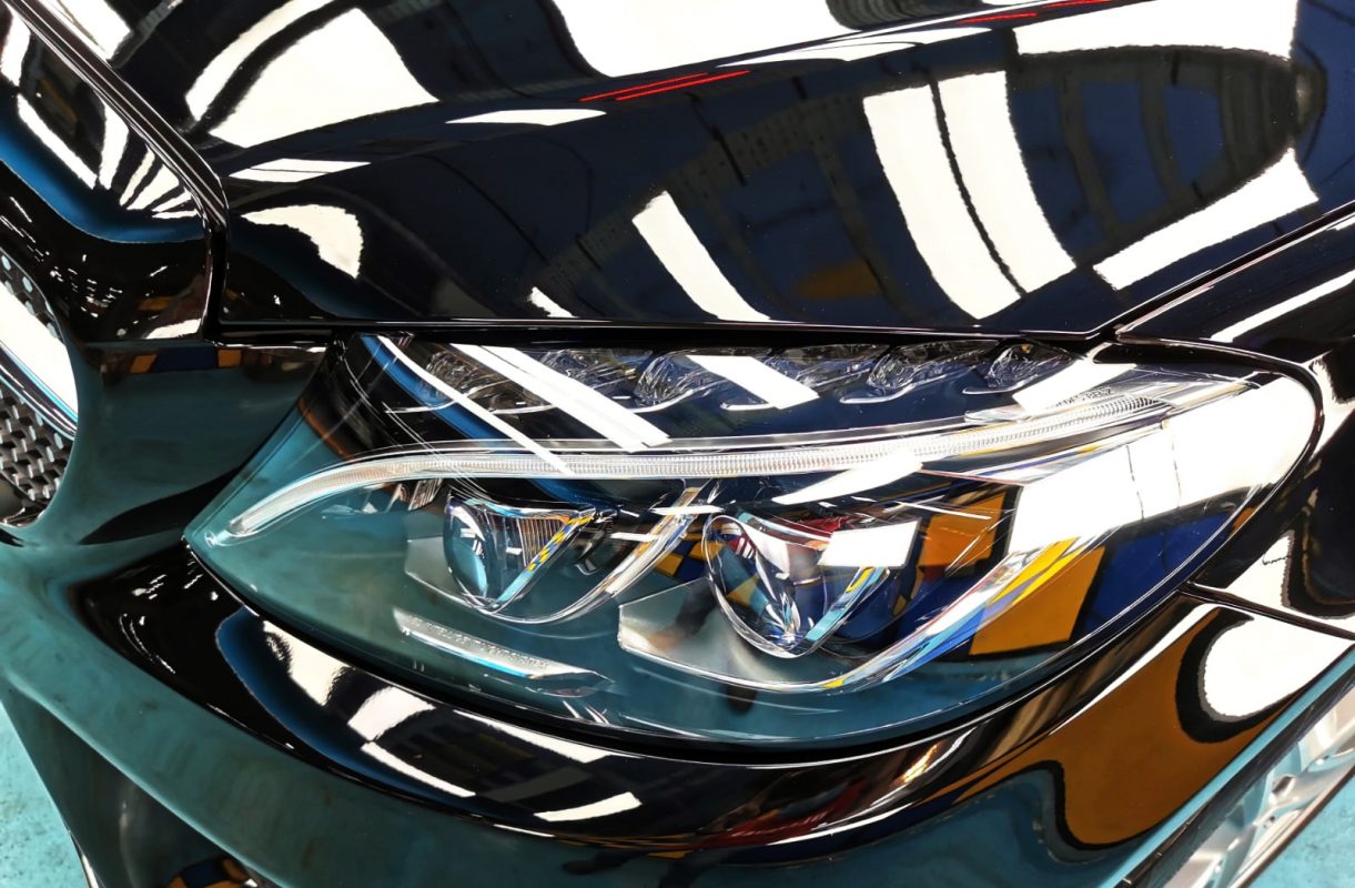 The C300's coated paintwork showing clean reflections.