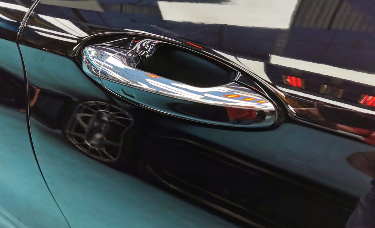 Front three-quarter view of the black Mercedes-Benz C300 after coating.