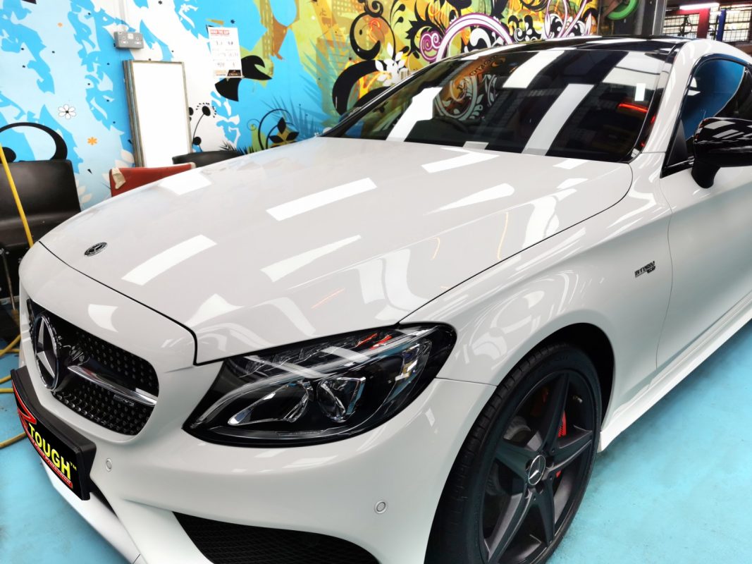 The Mercedes-Benz C43 AMG from a side angle after the ceramic coating.