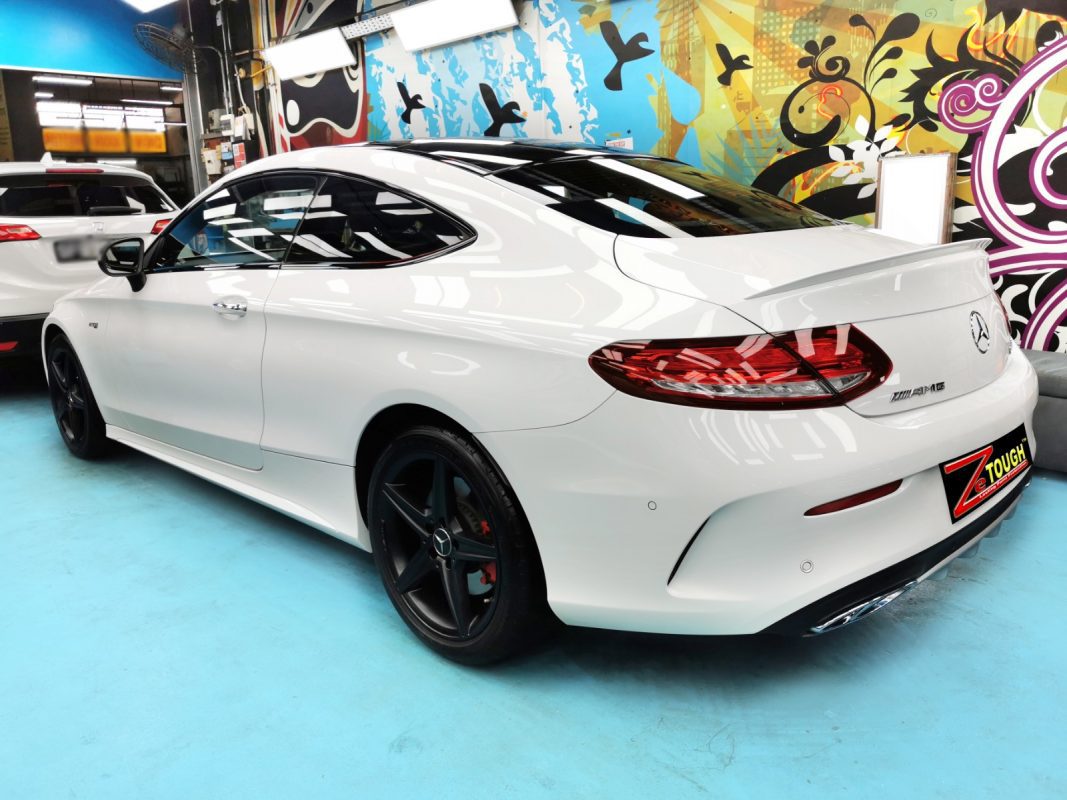 Rear quarter of the Mercedes-Benz C43 AMG, glossy and protected.