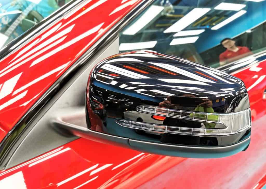 Side panel of the red Mercedes-Benz CLA 180 with the ceramic finish locked in.