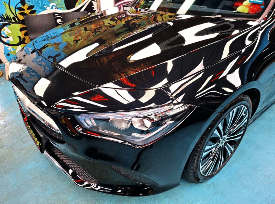 The Mercedes-Benz CLA180 from a side angle after the ceramic coating.