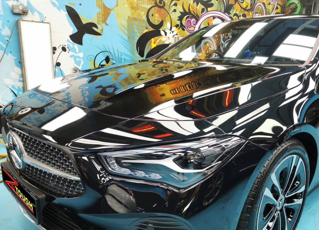 The Mercedes-Benz CLA180 from a side angle after the ceramic coating.