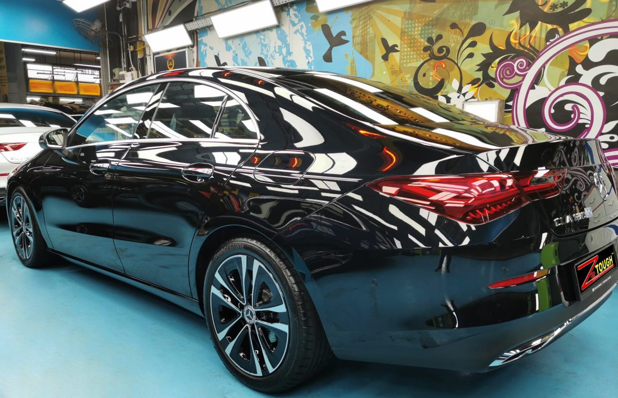 Rear quarter of the Mercedes-Benz CLA180, glossy and protected.