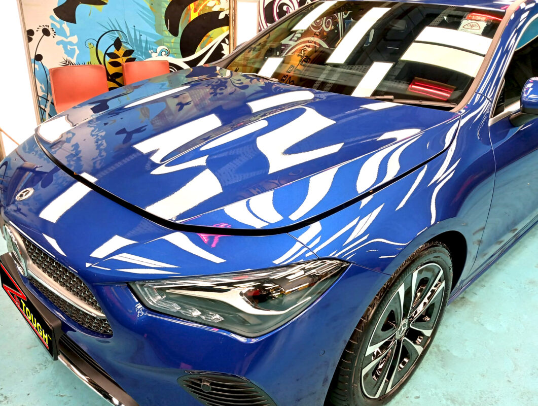 The Mercedes-Benz CLA180 from a side angle after the ceramic coating.