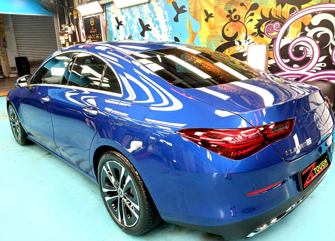 Rear quarter of the Mercedes-Benz CLA180, glossy and protected.