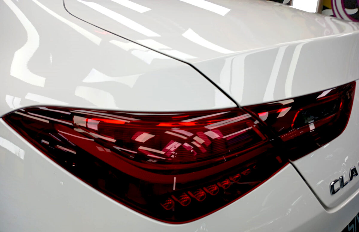 Rear quarter of the Mercedes-Benz CLA180, glossy and protected.