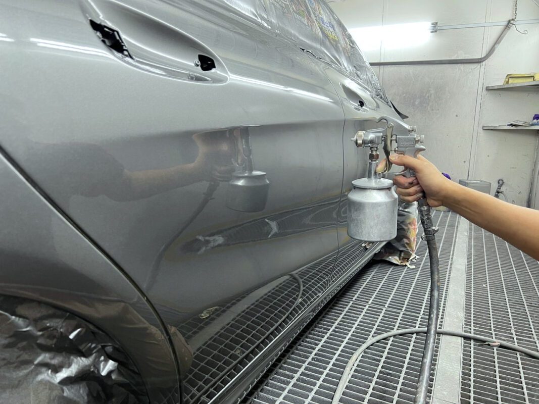 Machine-polishing the CLA180's panels after painting to bring up the gloss.