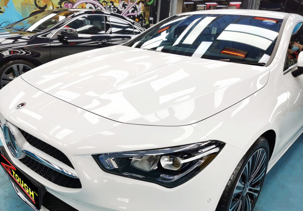 The Mercedes-Benz CLA180 from a side angle after the ceramic coating.
