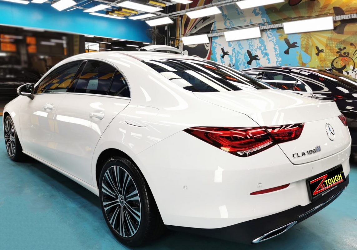 Rear quarter of the Mercedes-Benz CLA180, glossy and protected.