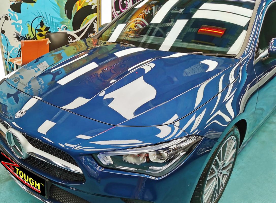 The Mercedes-Benz CLA180 from a side angle after the ceramic coating.