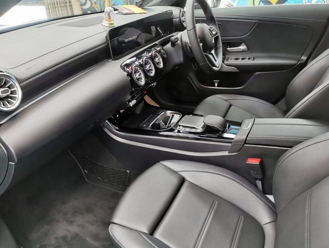 The Mercedes-Benz CLA180 parked in the workshop, freshly coated.
