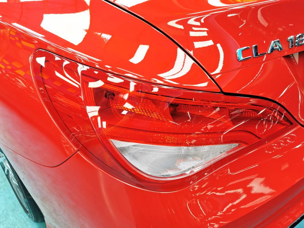 The coated bonnet of the CLA180 under workshop lighting.