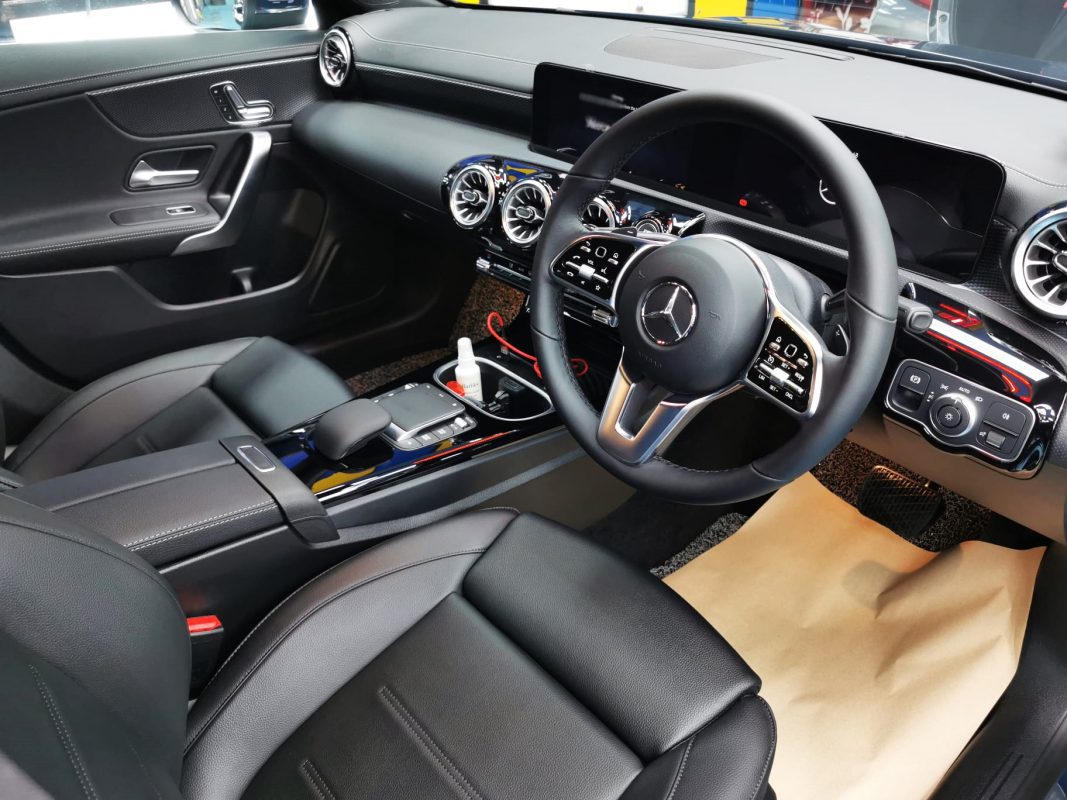 The Mercedes-Benz CLA180 parked in the workshop, freshly coated.