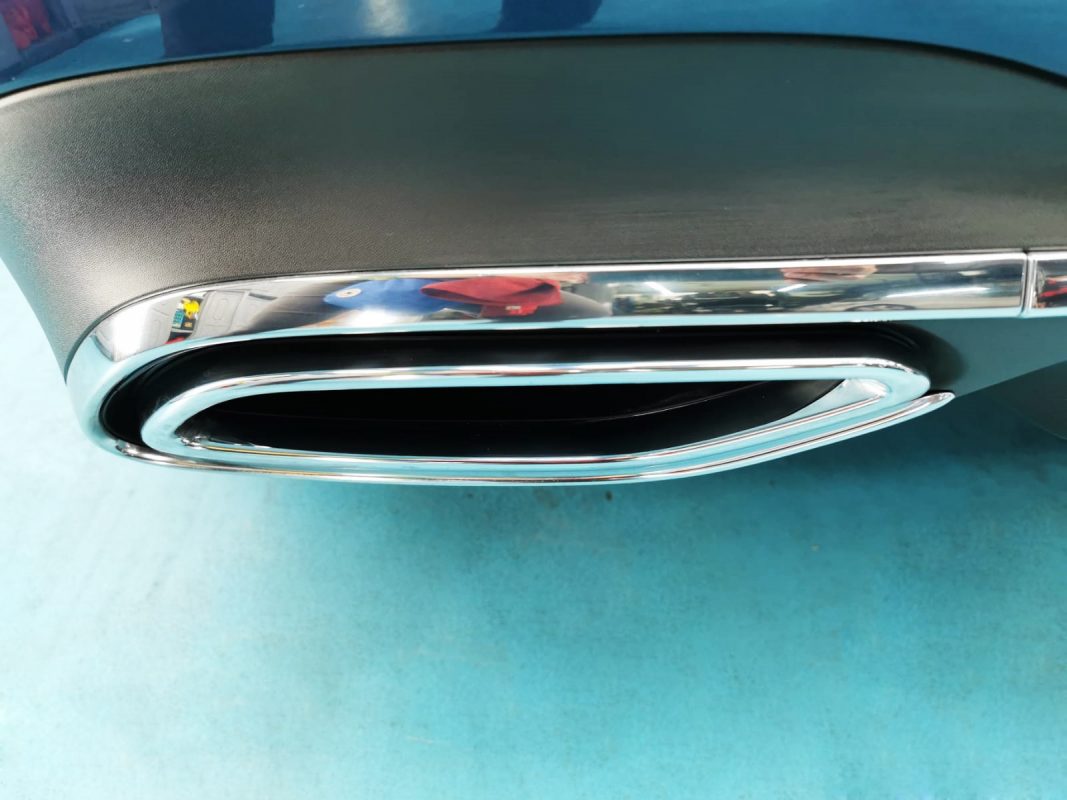 The coated bonnet of the CLA180 under workshop lighting.