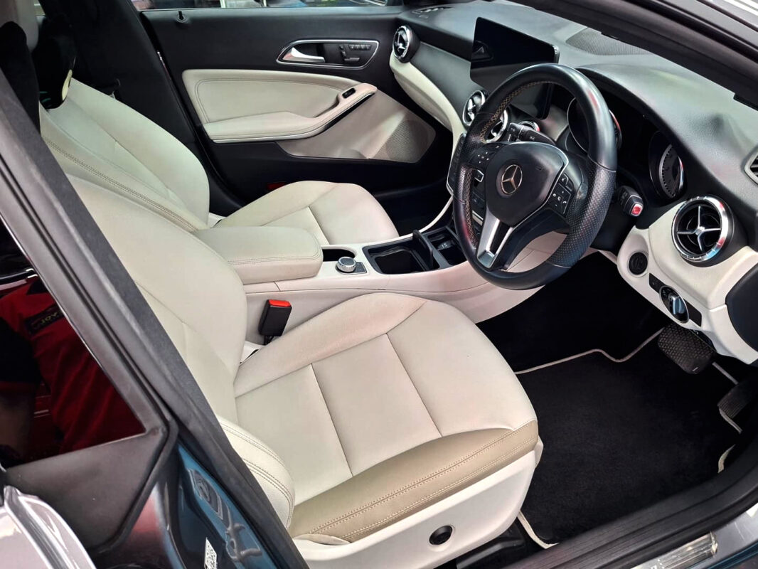 The Mercedes-Benz CLA200 parked in the workshop, freshly coated.