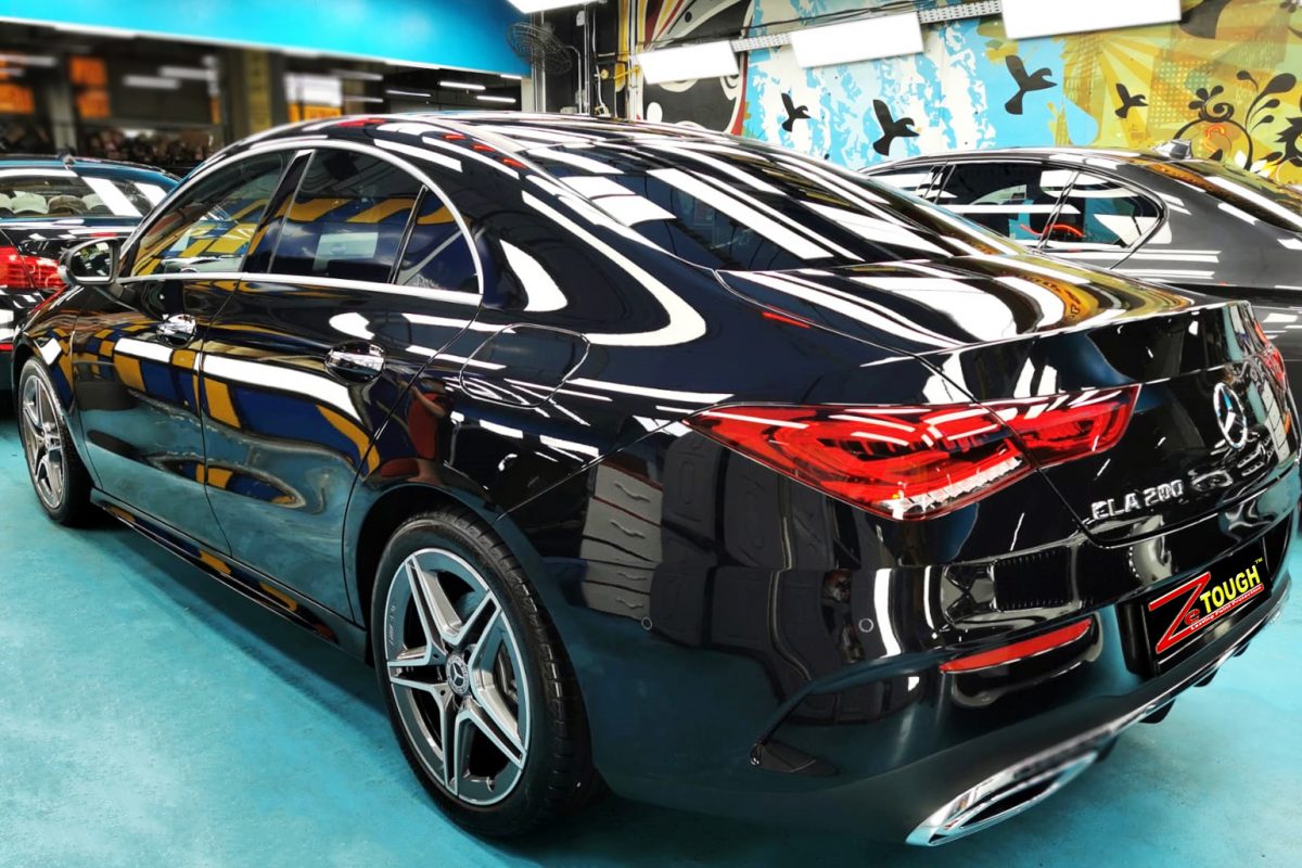 Rear quarter of the CLA200, glossy and protected.
