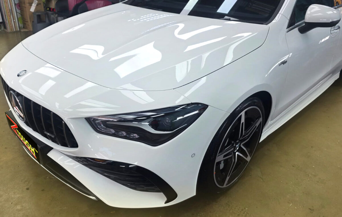 The Mercedes-Benz CLA35 from a side angle after the ceramic coating.