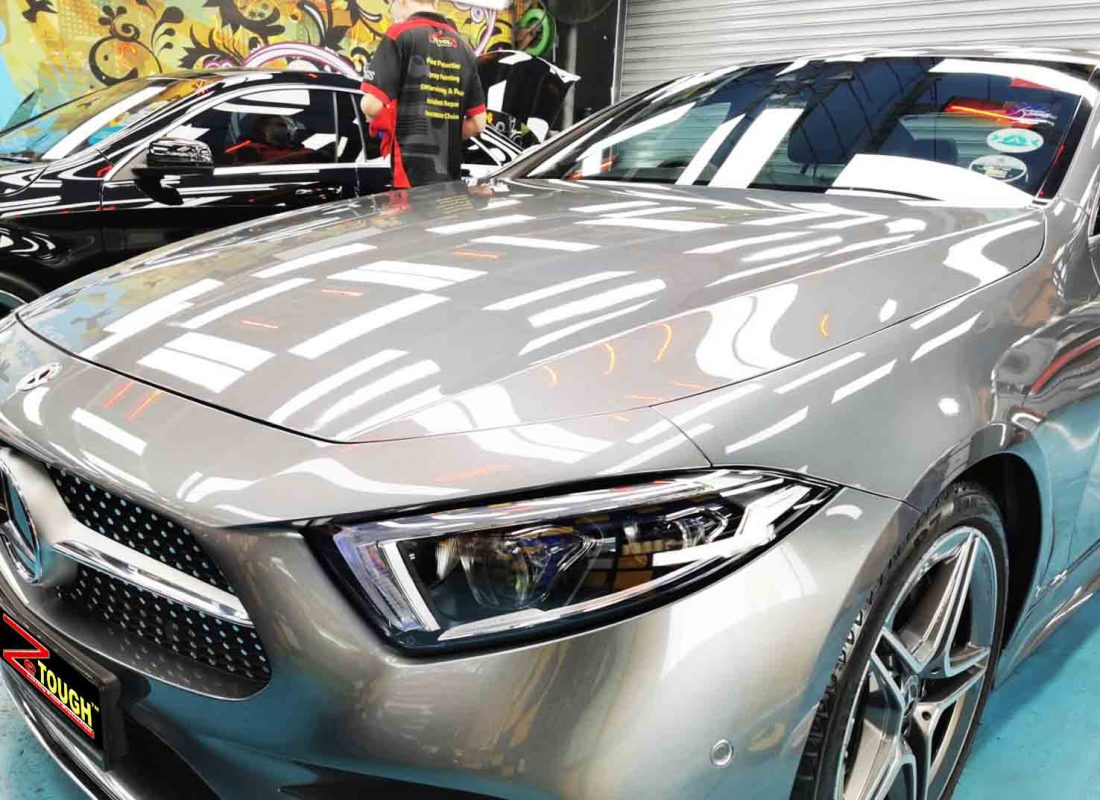 The Mercedes-Benz CLS 350 from a side angle after the ceramic coating.