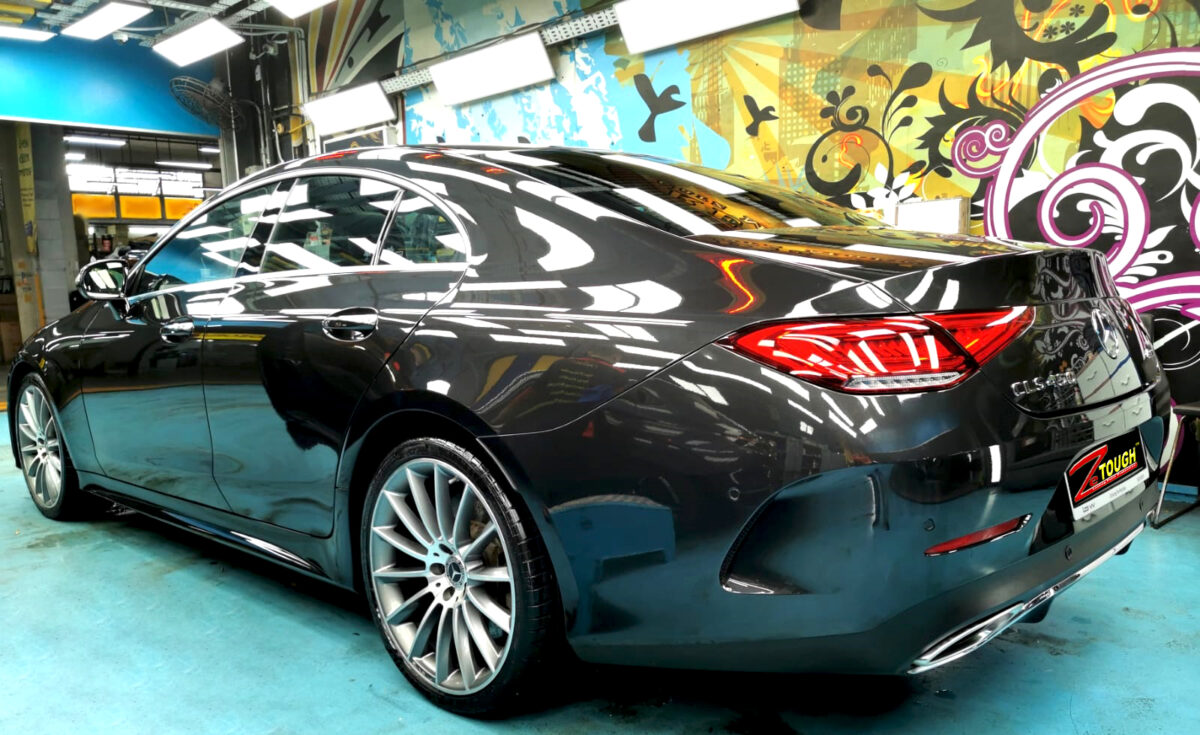 Rear quarter of the Mercedes-Benz CLS450, glossy and protected.