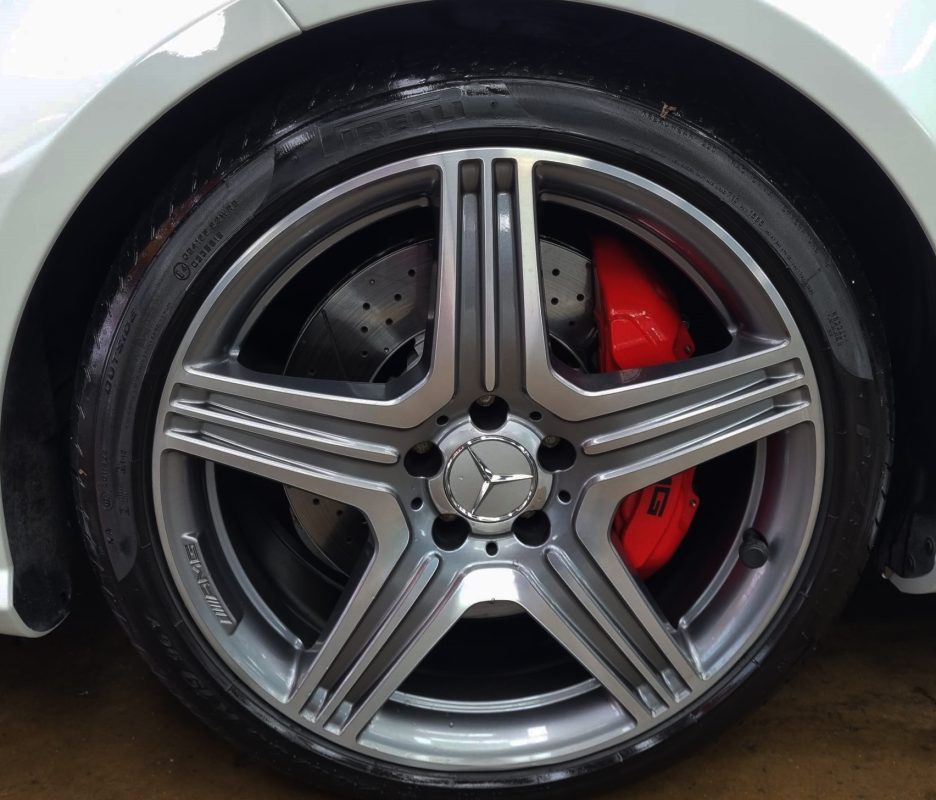 Rear quarter of the Mercedes-Benz CLS63, glossy and protected.