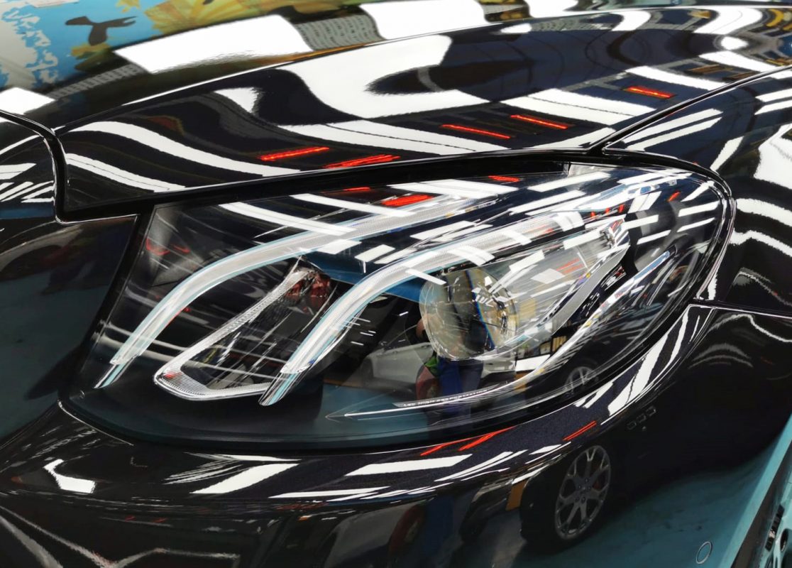 The E180's coated paintwork showing clean reflections.