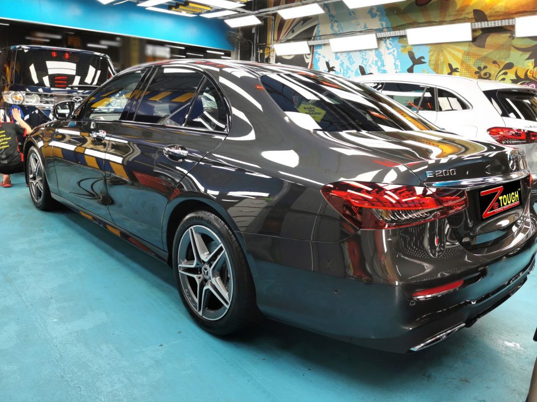 Rear quarter of the Mercedes-Benz E200 AMG, glossy and protected.