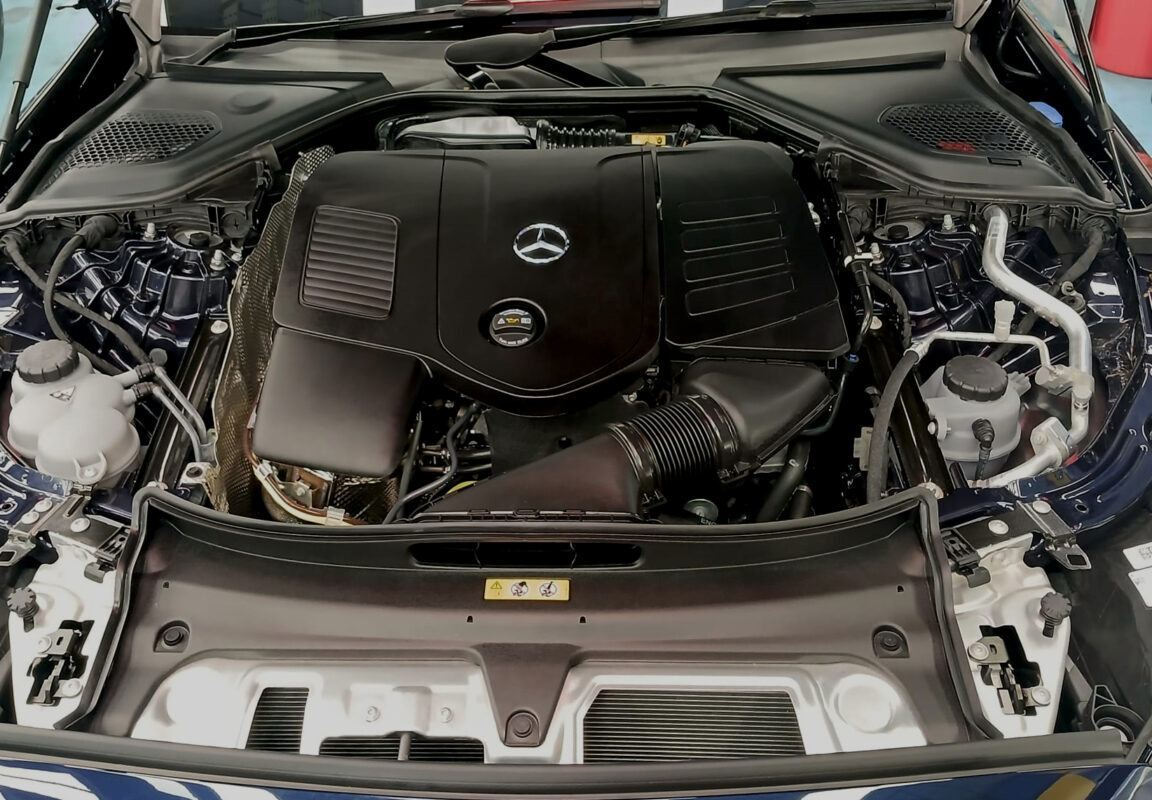 The E200's coated paintwork showing clean reflections.