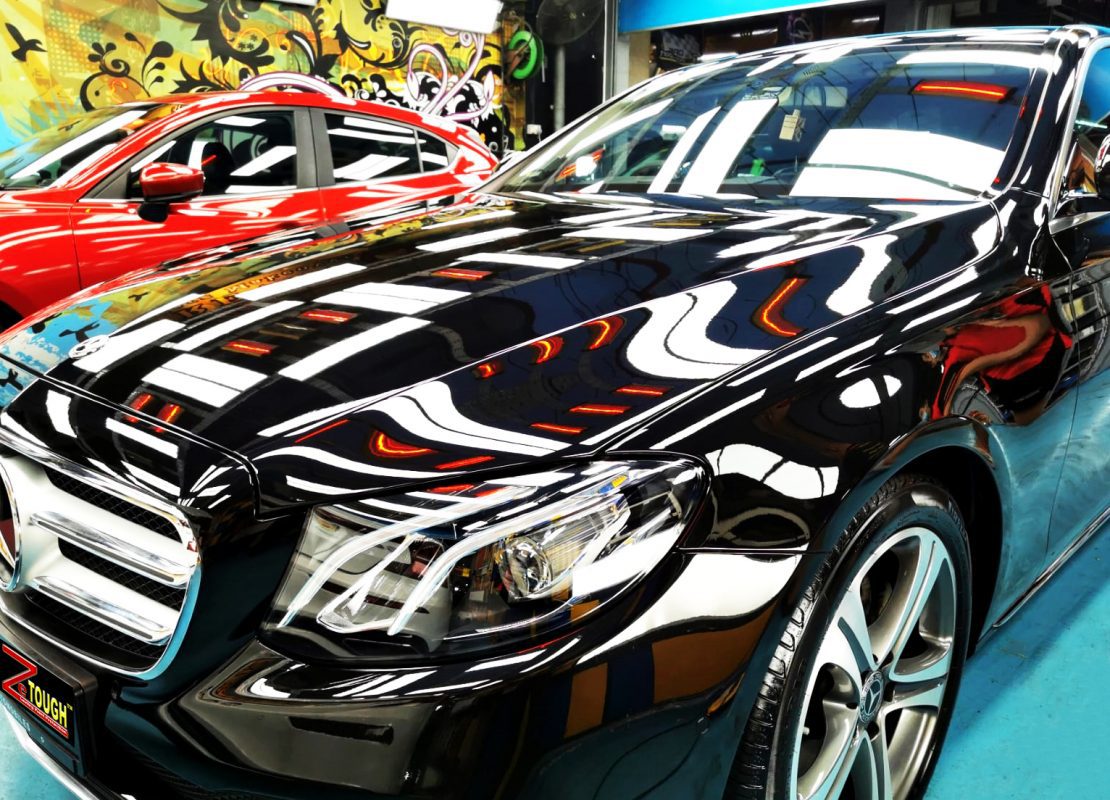 The Mercedes-Benz E200 from a side angle after the ceramic coating.