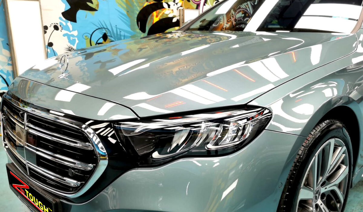 The Mercedes-Benz E200 from a side angle after the titanium coating.