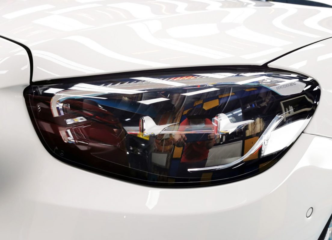 The E200's coated paintwork showing deep reflections.