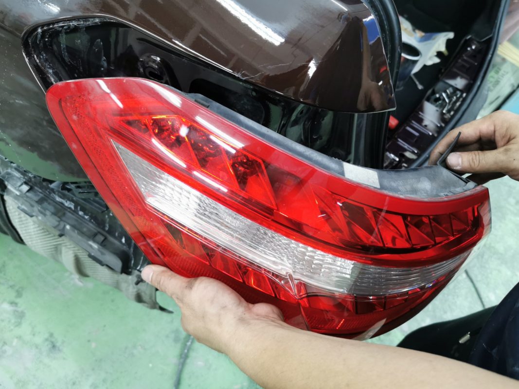 Compound polishing the new paint on the E200 to bring up the shine.