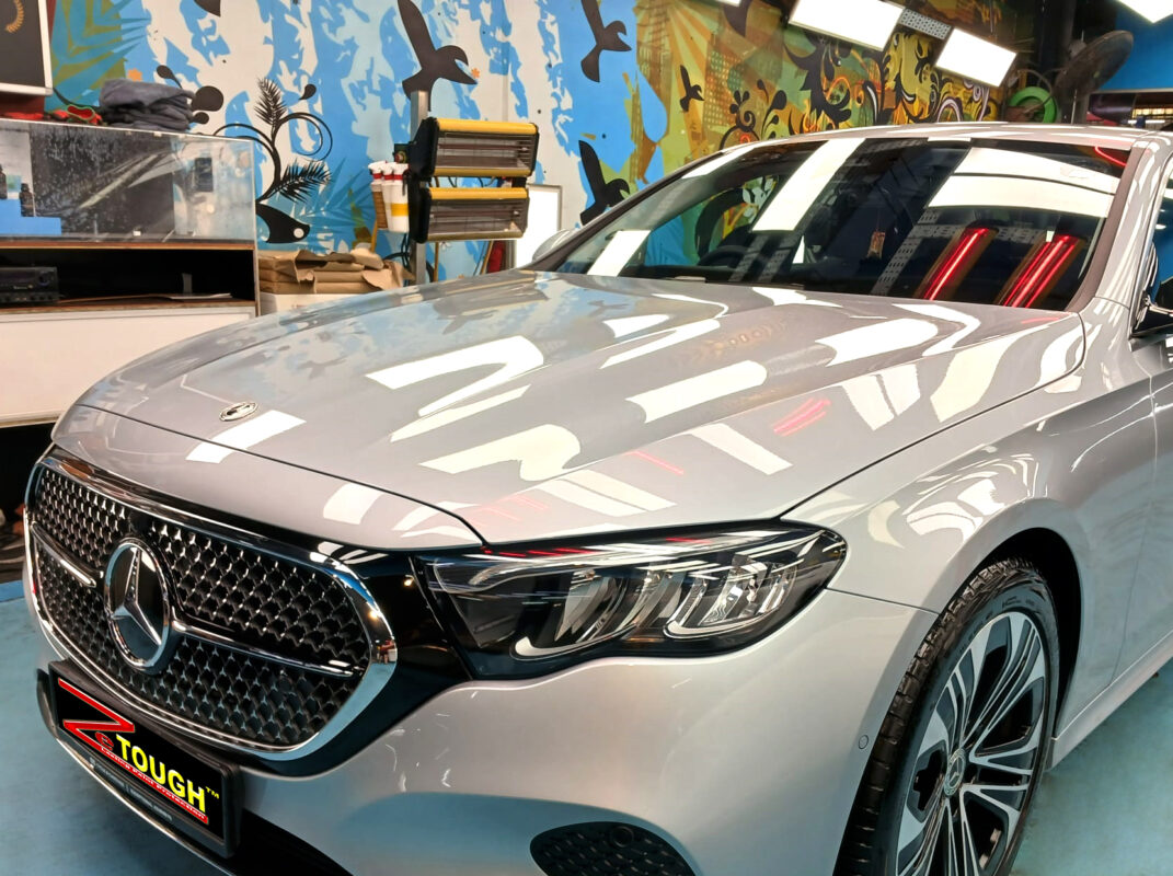 The Mercedes-Benz E200 from a side angle after the ceramic coating.
