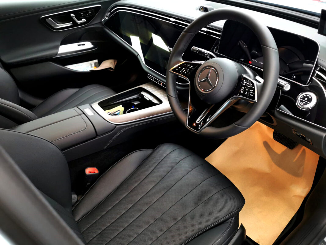 The Mercedes-Benz E200 parked in the workshop, freshly coated.