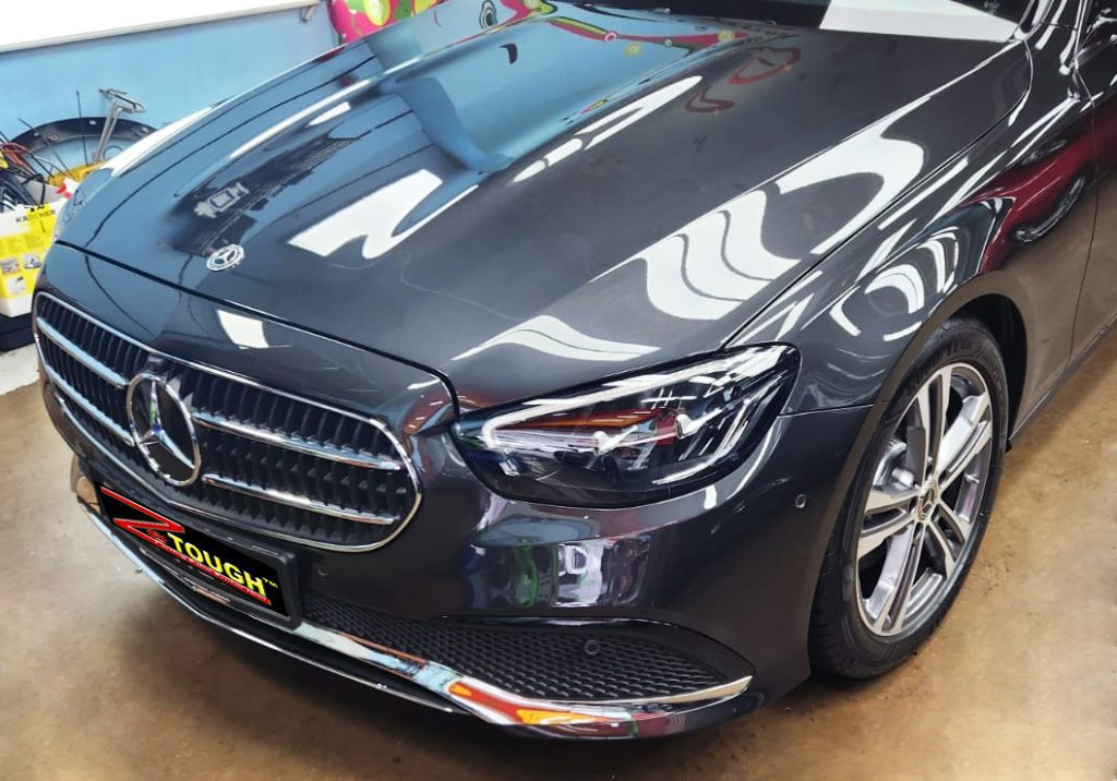 The Mercedes-Benz E200 from a side angle after the titanium coating.