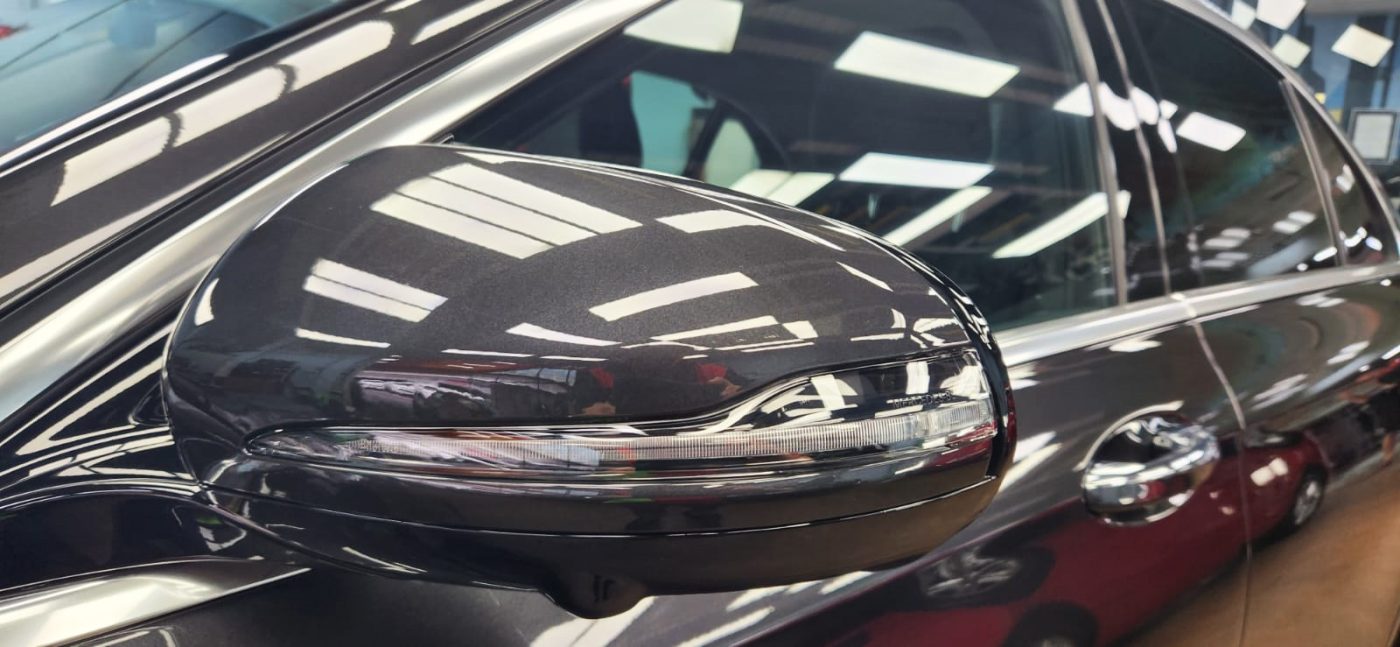 Side panel of the Mercedes-Benz E200 with the titanium finish locked in.